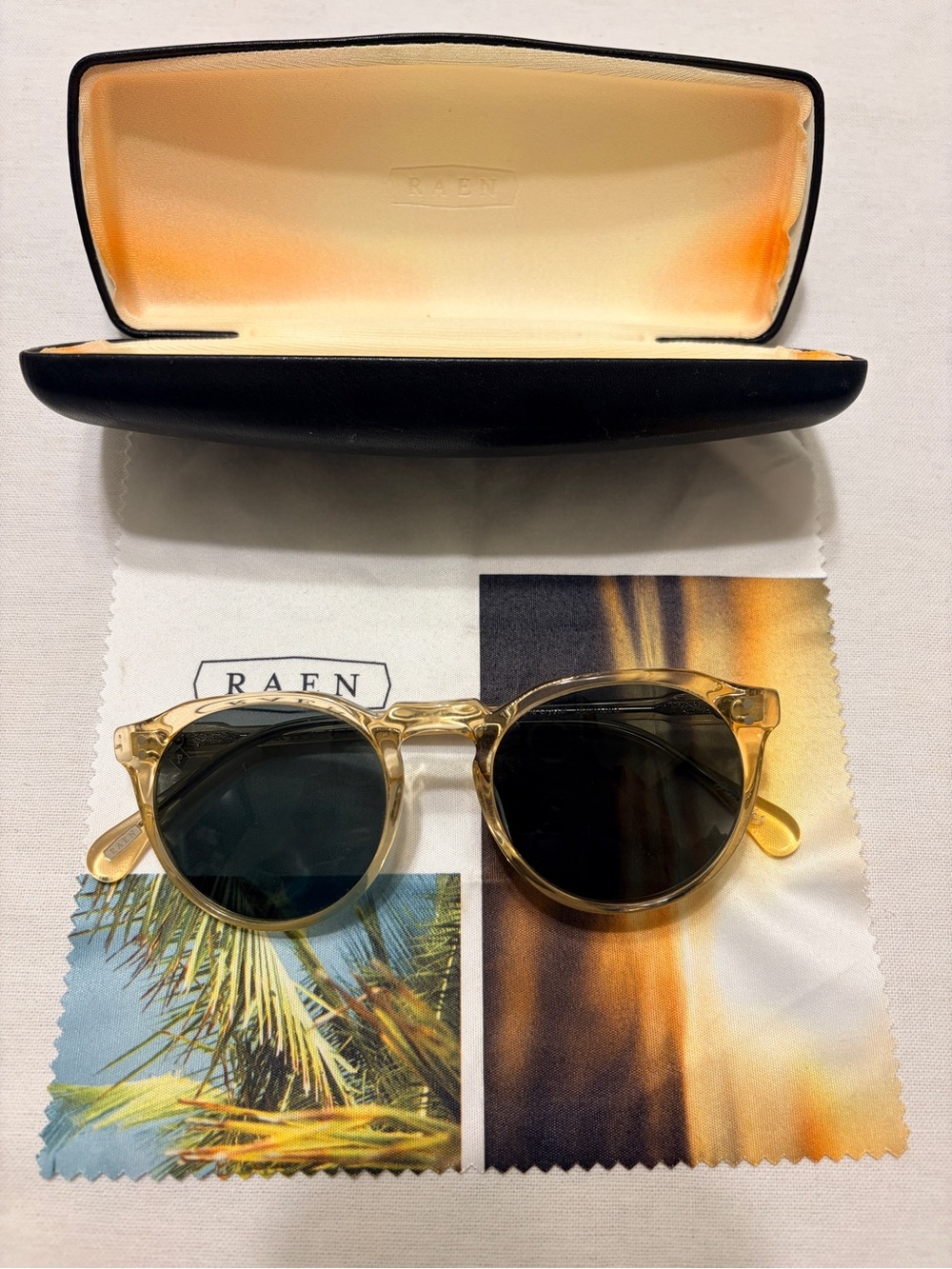 RAEN Men’s Clear Amber “Champagne” Frame Sunglasses with Dark Lenses Remmy 49